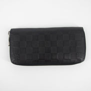 Louis Vuitton Black Damier Infini Vertical Zippy Wallet