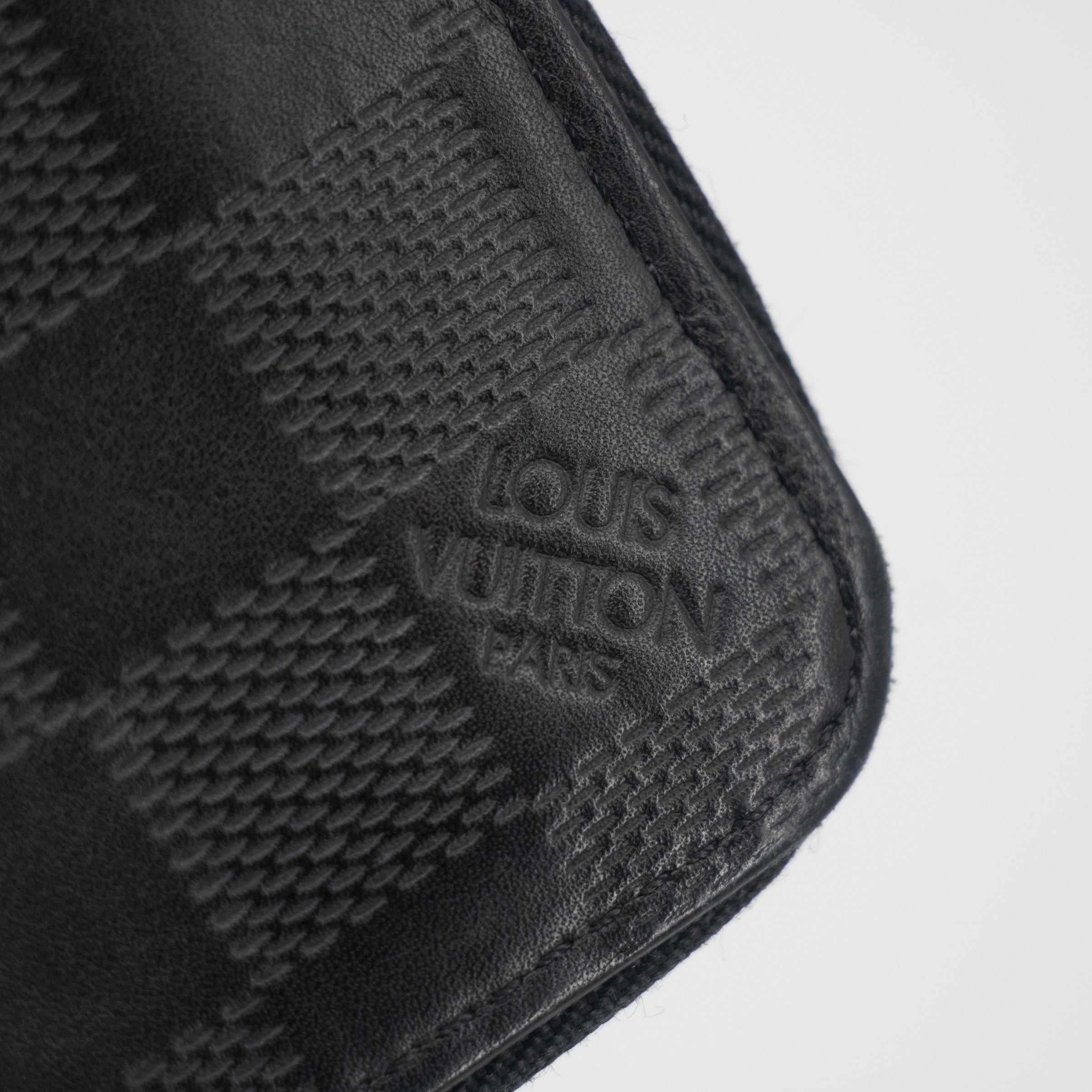 Louis Vuitton Black Damier Infini Vertical Zippy Wallet